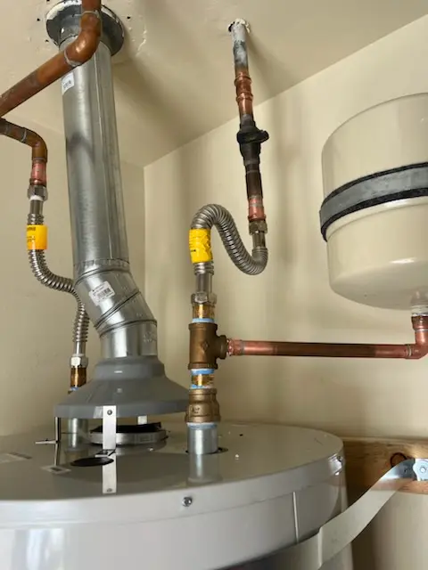Water heater installation and plumbing repair in Airport North